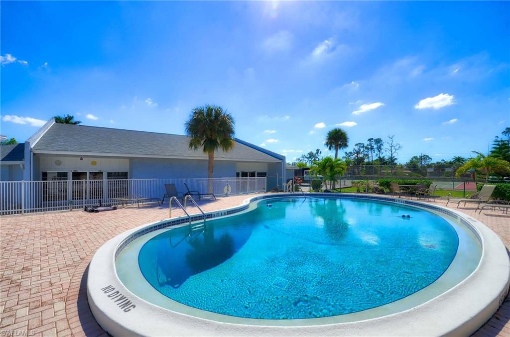 14 Watercolor Way, Unit 14 Naples, FL 34113 - Photo 26 of 28 a view of a house with swimming pool and sitting area