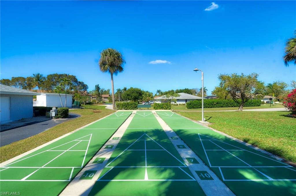 14 Watercolor Way, Unit 14 Naples, FL 34113 - Photo 27 of 28 a view of a basketball court