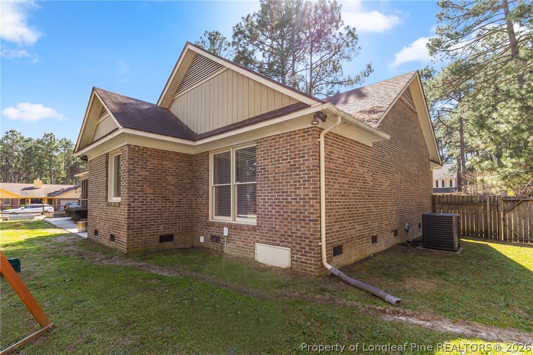 7756 Dragonhead Road Fayetteville, NC 28311 - Photo 39 of 42 a view of a house with a yard