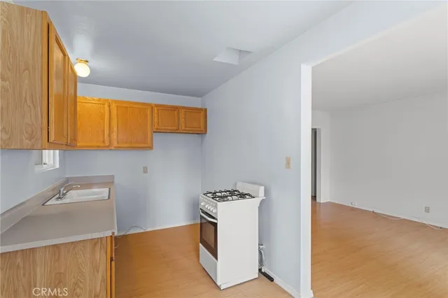 a view of storage and utility room with a sink