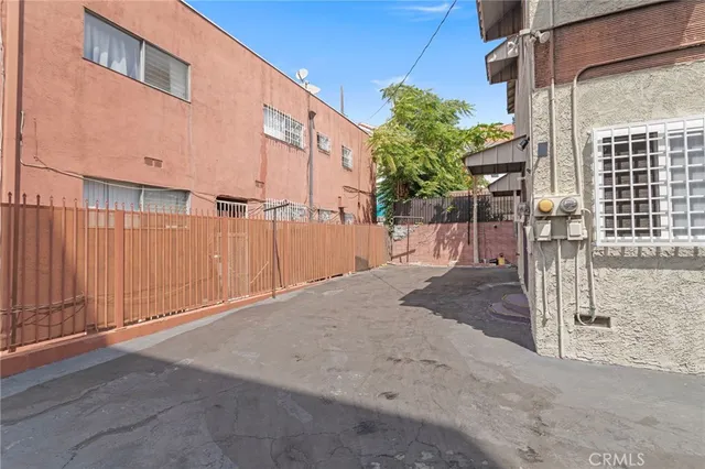 a view of a house with a street