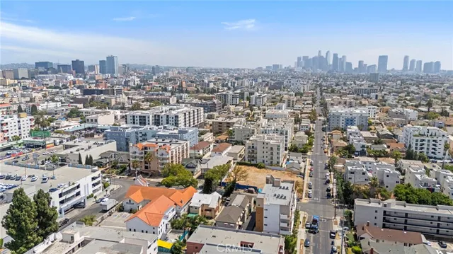 an aerial view of a city with lots of residential buildings