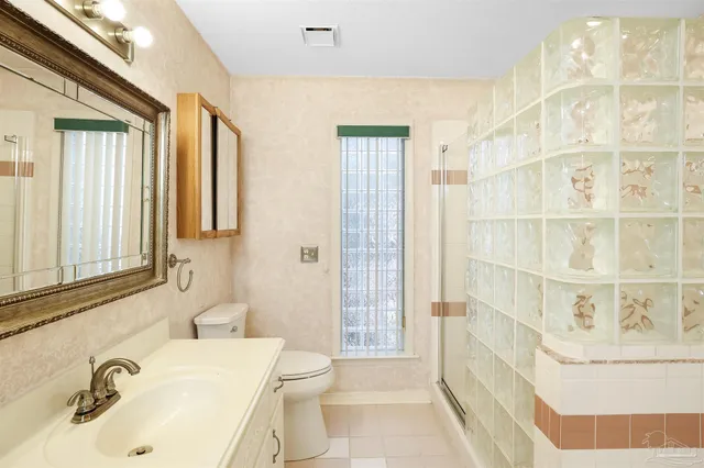 a bathroom with a sink and a shower