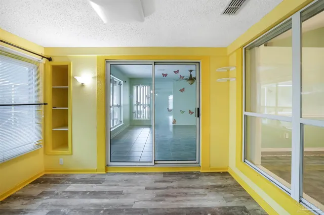 a view of a bathroom with a glass door