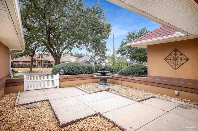 a view of house with outdoor seating