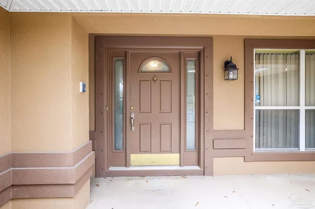 a view of an entryway with a chandelier