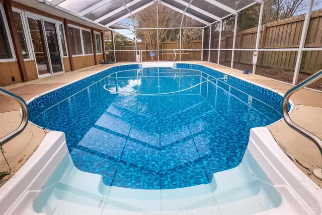 a view of a house with swimming pool