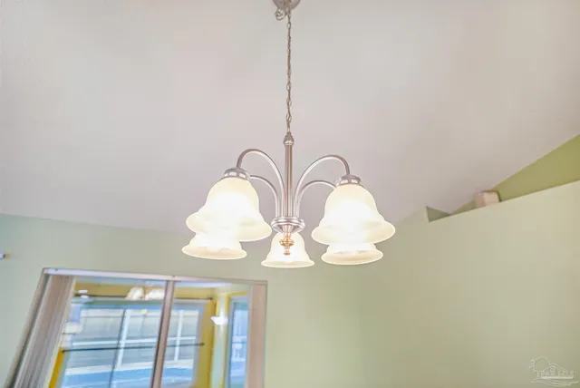 a front view of a house with a wooden door