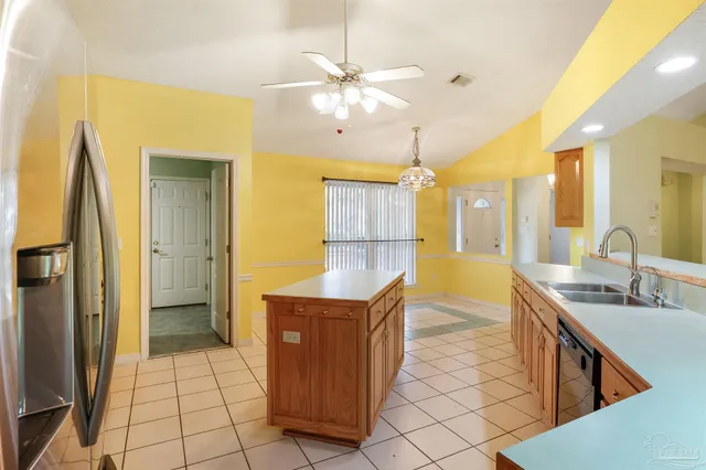 a bathroom with a sink a mirror and a shower