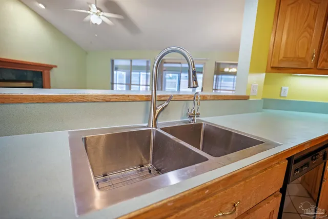 a kitchen with a sink and a window