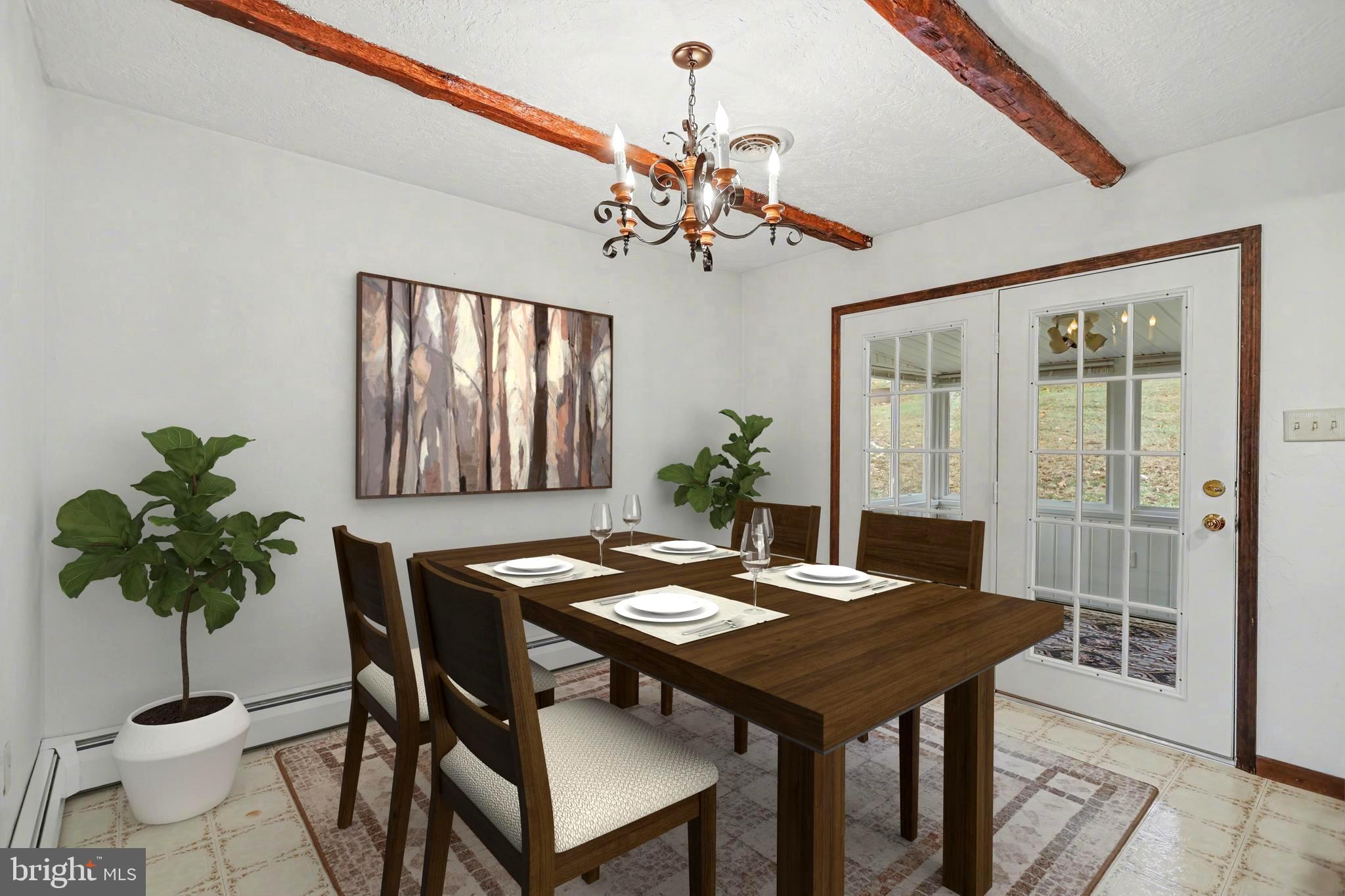 5680 Crone Road Dover, PA 17315 - Photo 12 of 47 a view of a dining room with furniture window and wooden floor
