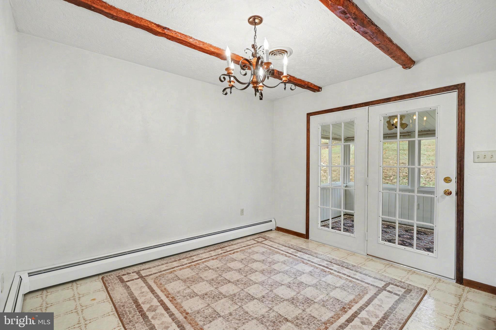 5680 Crone Road Dover, PA 17315 - Photo 13 of 47 a view of a room with a ceiling fan and window