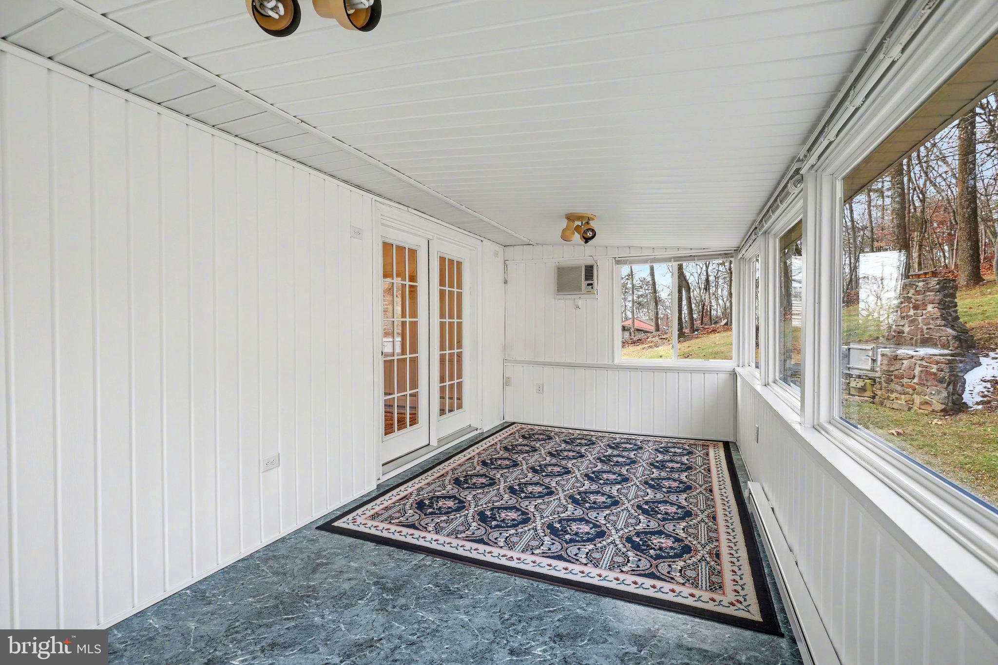 5680 Crone Road Dover, PA 17315 - Photo 18 of 47 a view of a livingroom with wooden floor and a rug