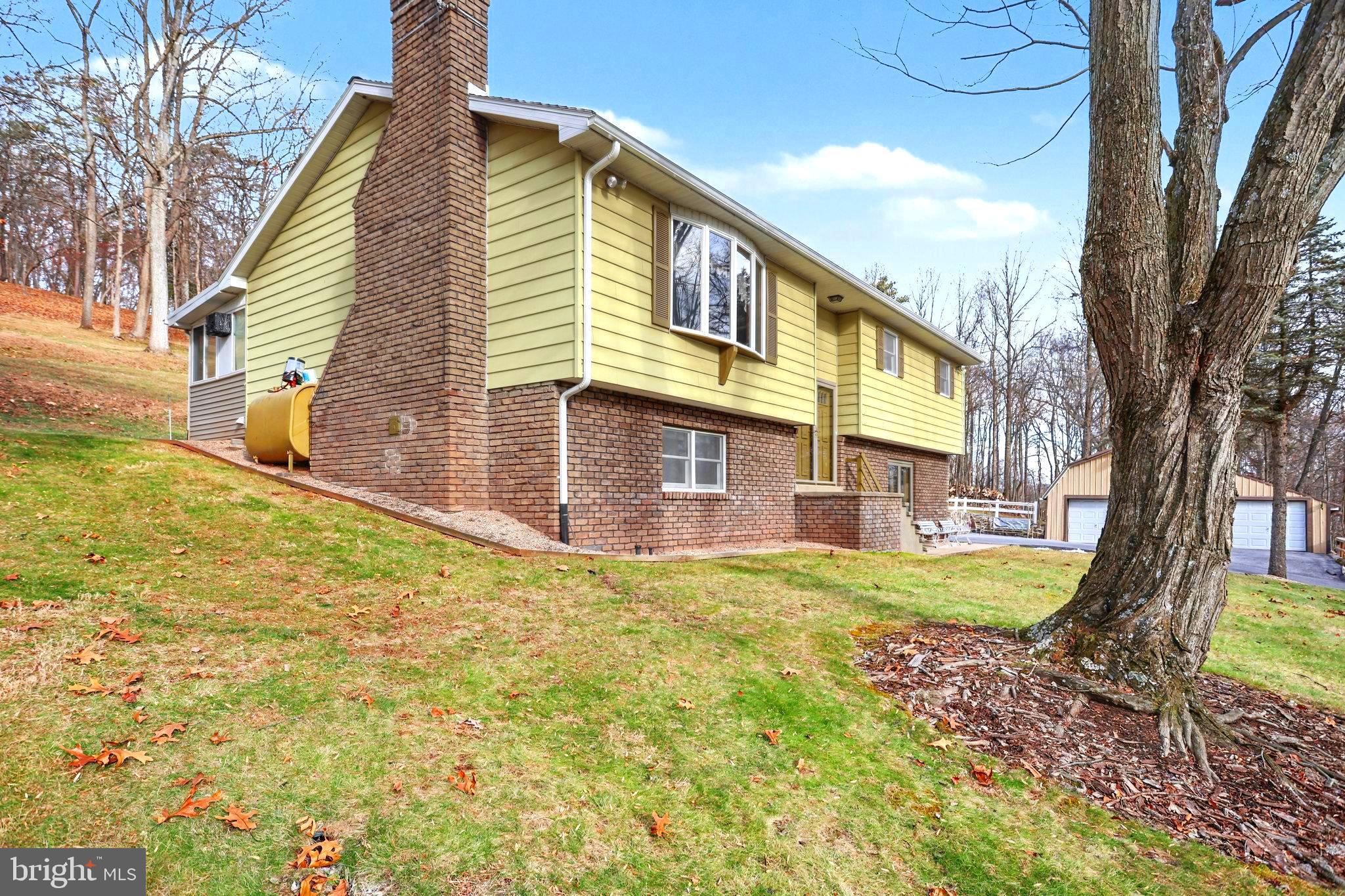 5680 Crone Road Dover, PA 17315 - Photo 2 of 47 a view of a house with a yard