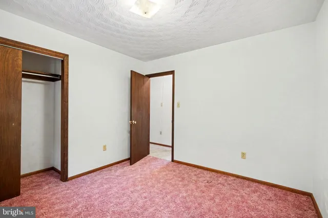 an empty room with an entryway