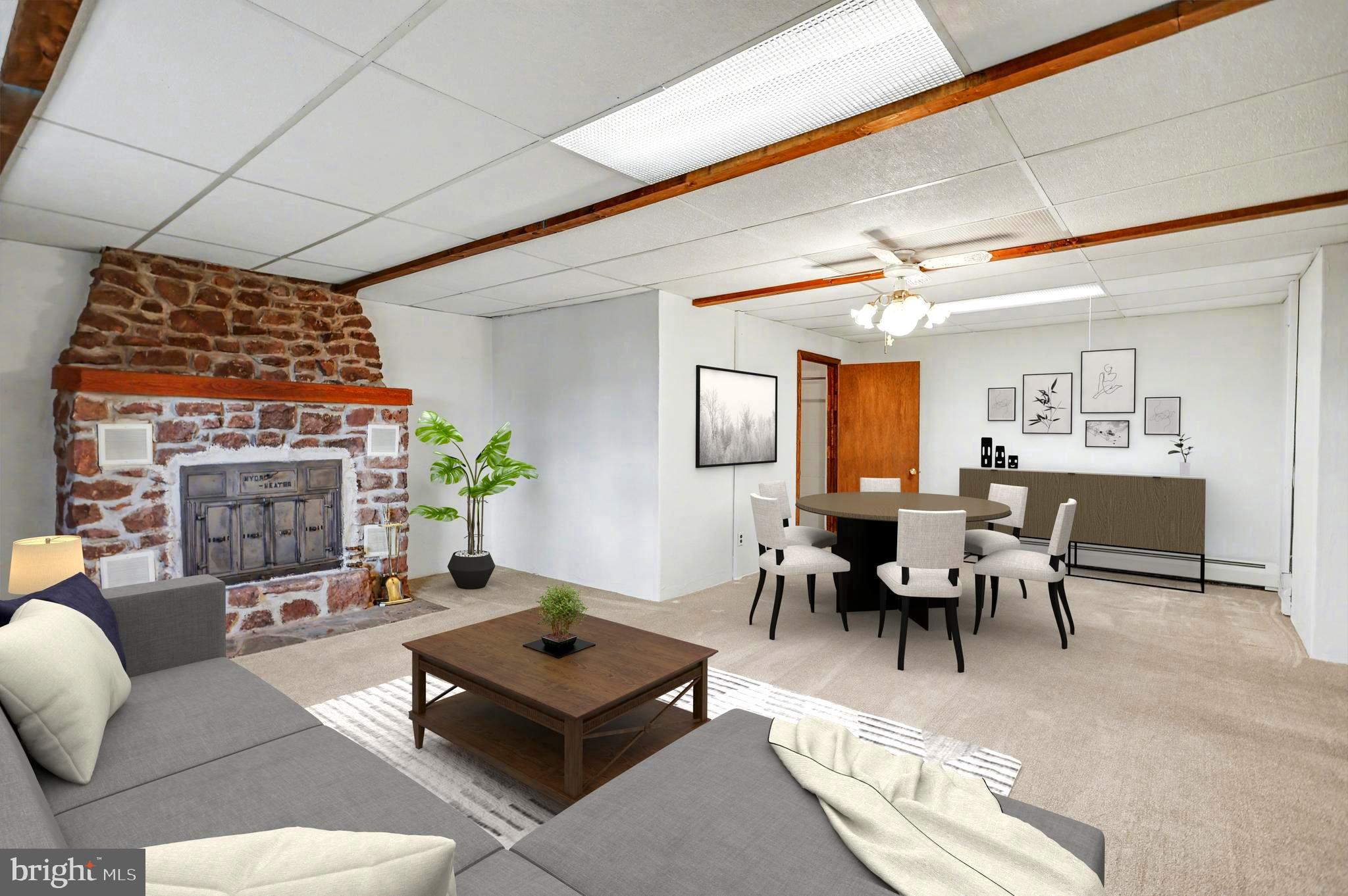 5680 Crone Road Dover, PA 17315 - Photo 29 of 47 a living room with furniture a table and a fireplace