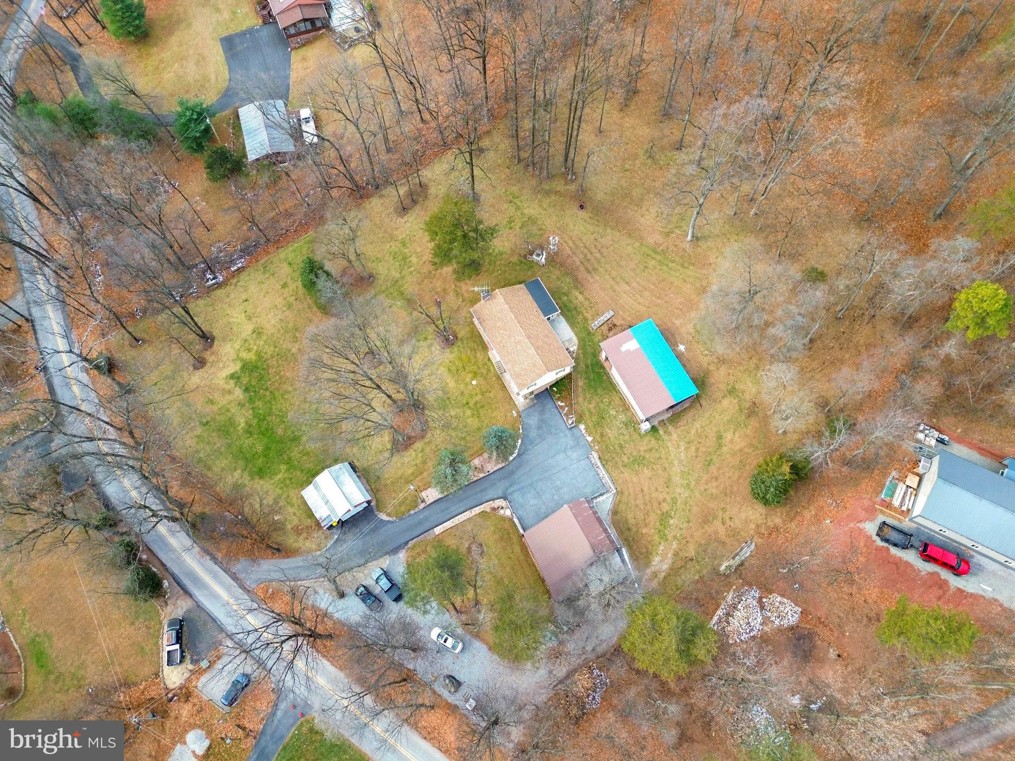 5680 Crone Road Dover, PA 17315 - Photo 44 of 47 an aerial view of a house with a yard and wooden fence