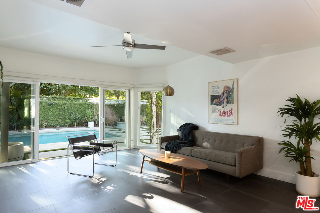 5719 Rhodes Avenue Valley Village, CA 91607 - Photo 12 of 55 a living room with furniture and a large window