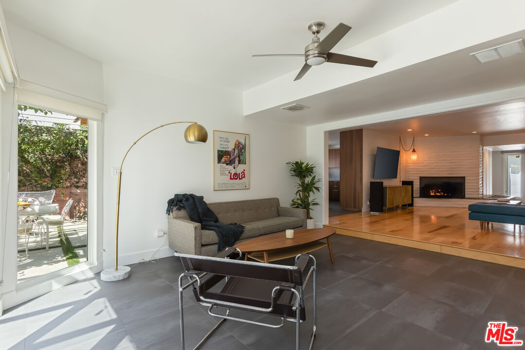 5719 Rhodes Avenue Valley Village, CA 91607 - Photo 14 of 55 a living room with patio furniture and a large window
