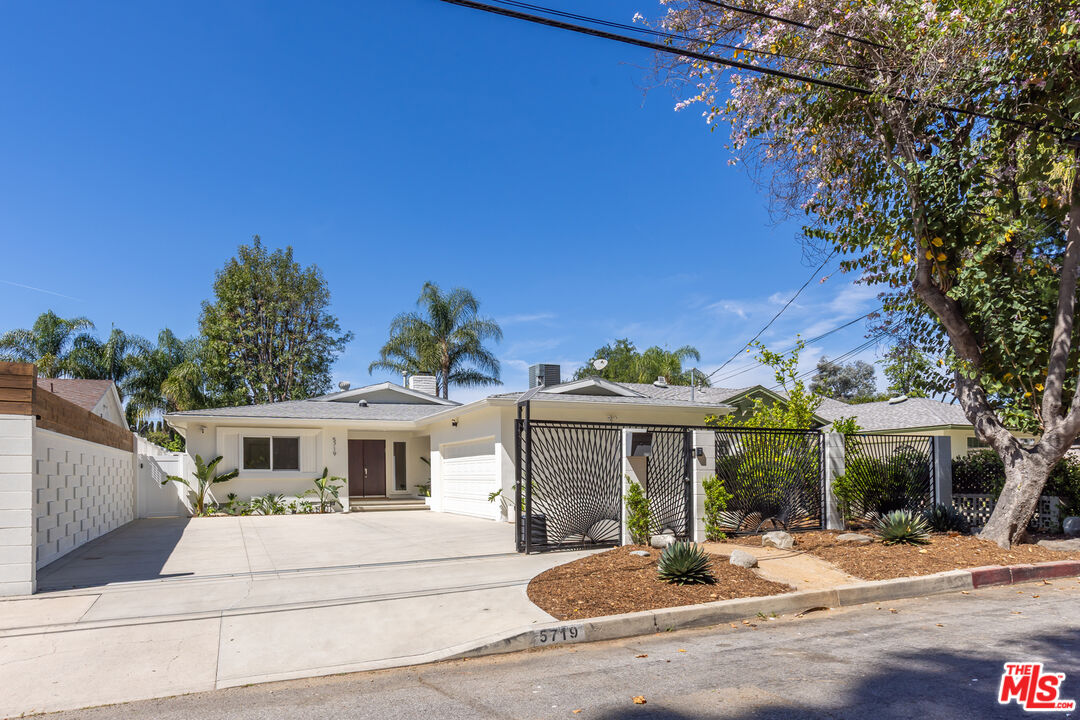 5719 Rhodes Avenue Valley Village, CA 91607 - Photo 2 of 55 a front view of a house with garden
