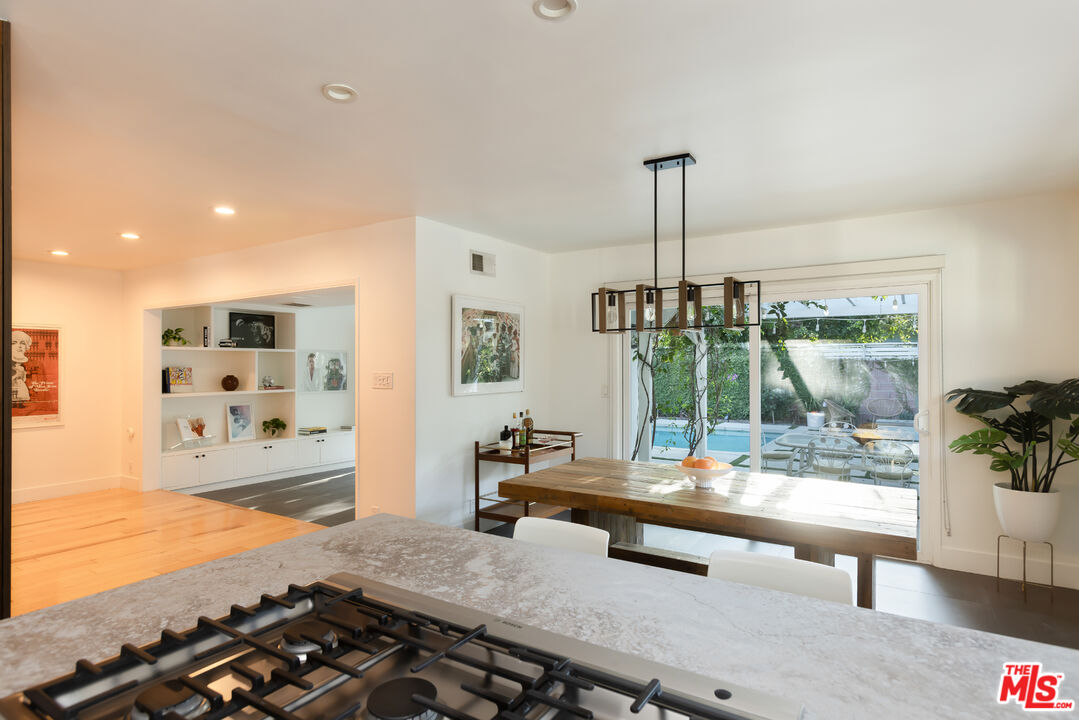 5719 Rhodes Avenue Valley Village, CA 91607 - Photo 21 of 55 a room with lots of furniture and a large window