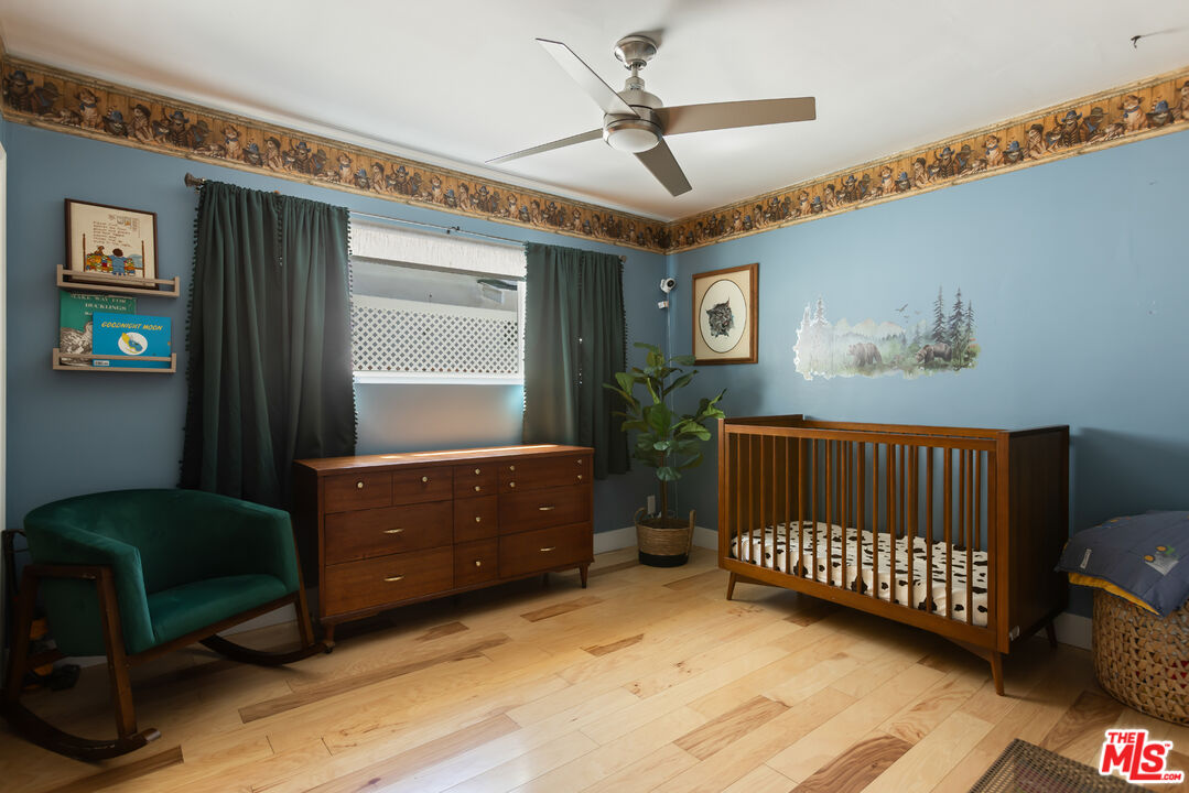 5719 Rhodes Avenue Valley Village, CA 91607 - Photo 42 of 55 a bedroom with a bed and a window