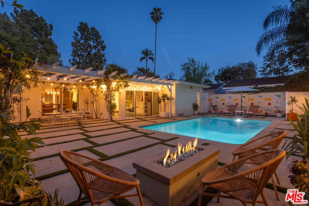 5719 Rhodes Avenue Valley Village, CA 91607 - Photo 52 of 55 a view of a chairs and table in the patio