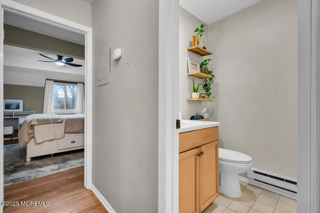 a view of a house with a big yard and sitting area