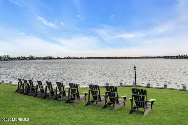 an aerial view of a city with ocean view