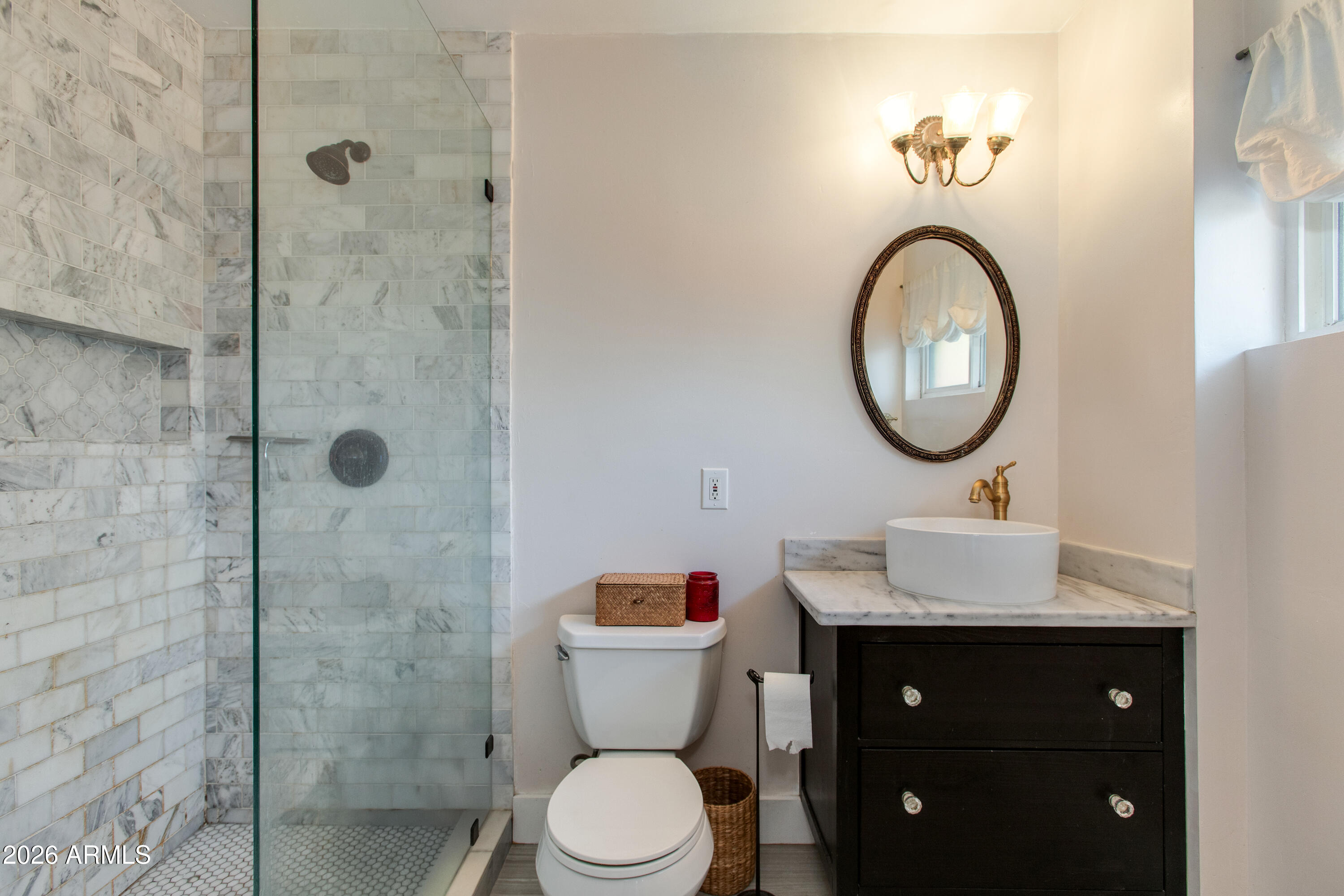 7830 North 7th Avenue Phoenix, AZ 85021 - Photo 18 of 43 a bathroom with a sink toilet and a mirror