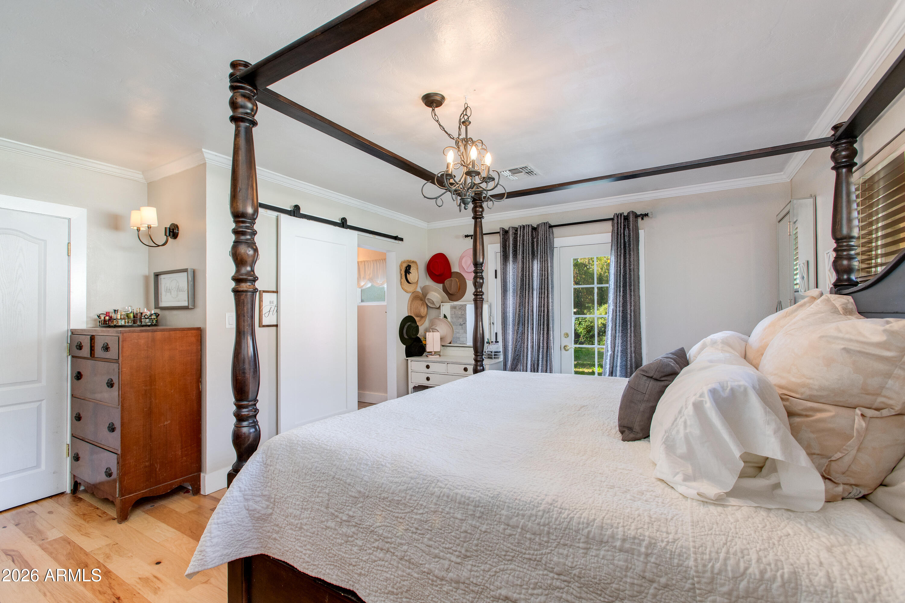 7830 North 7th Avenue Phoenix, AZ 85021 - Photo 19 of 43 a bedroom with a large bed and a window