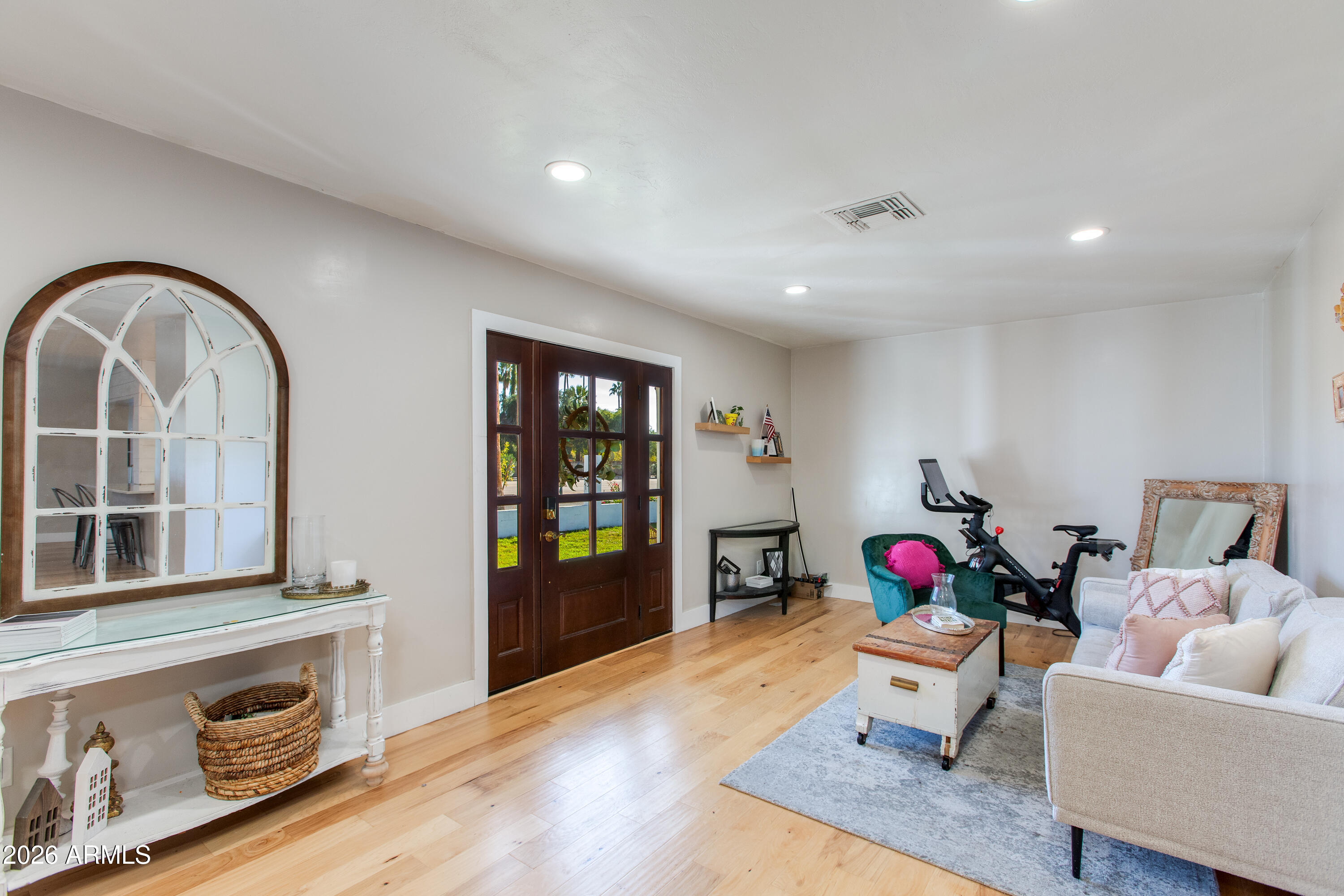 7830 North 7th Avenue Phoenix, AZ 85021 - Photo 20 of 43 a living room with furniture and a wooden floor