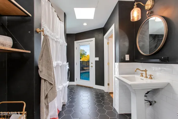 a utility room with dryer and washer