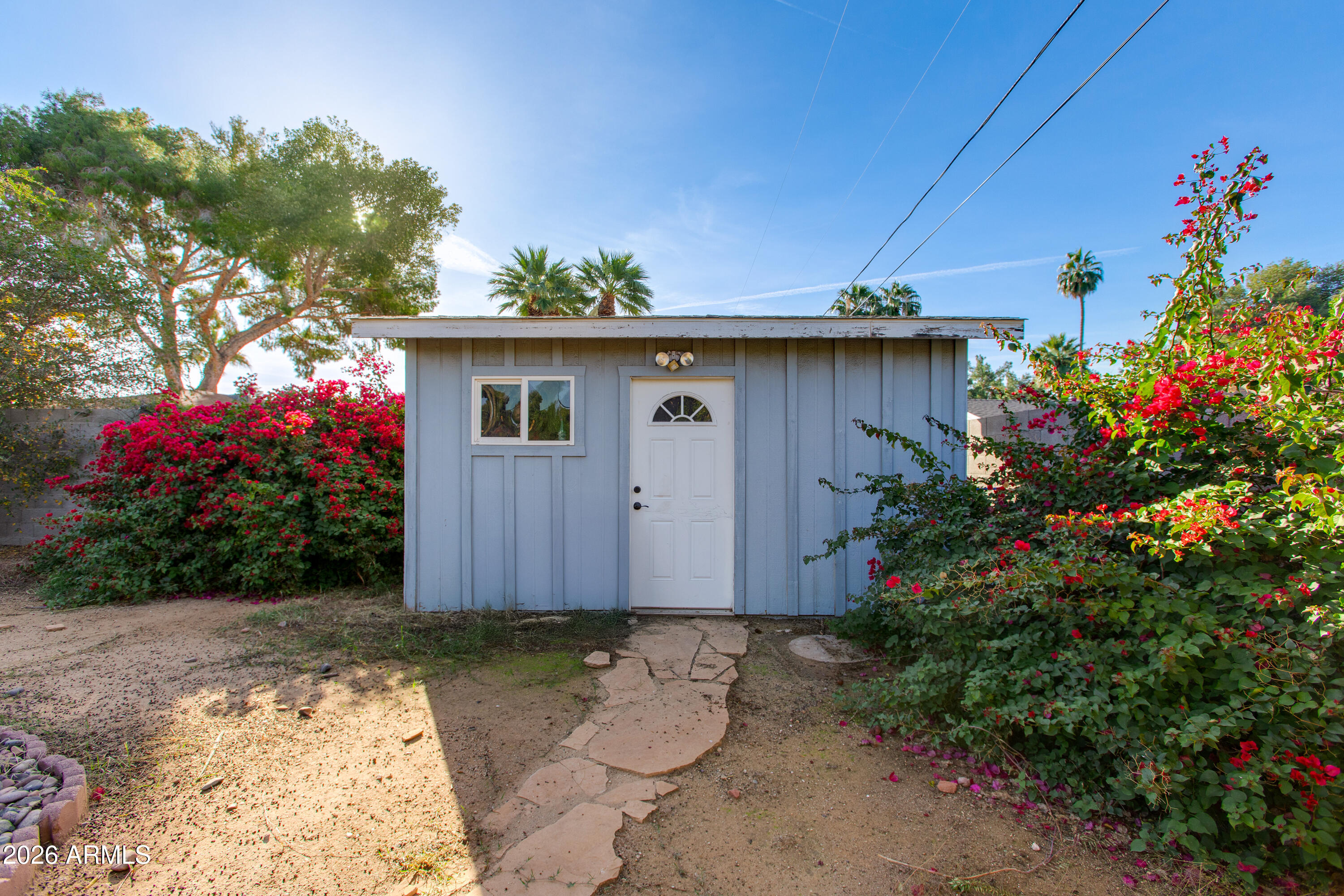 7830 North 7th Avenue Phoenix, AZ 85021 - Photo 30 of 43 a front view of house with yard