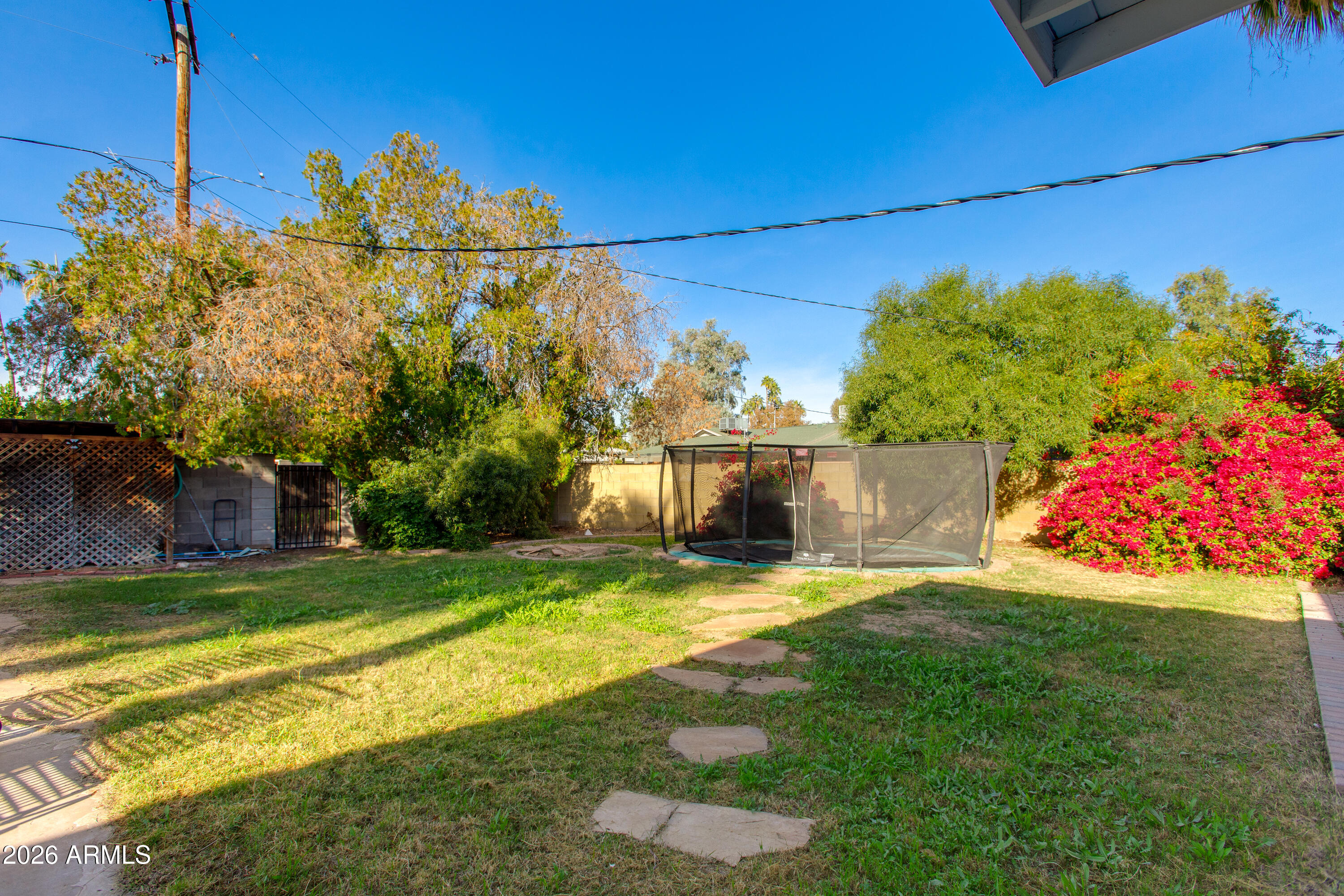7830 North 7th Avenue Phoenix, AZ 85021 - Photo 33 of 43 a view of a house with a yard