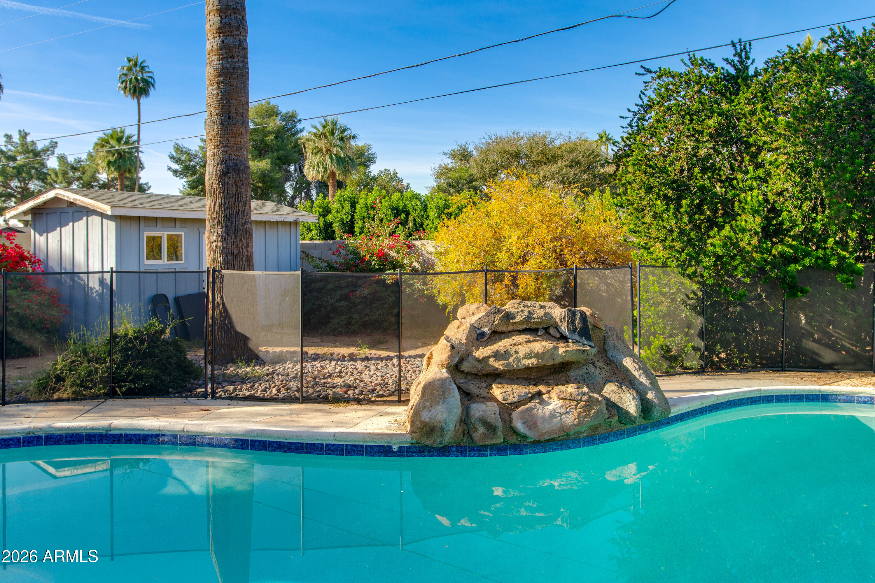 7830 North 7th Avenue Phoenix, AZ 85021 - Photo 40 of 43 a view of a house with backyard and sitting area
