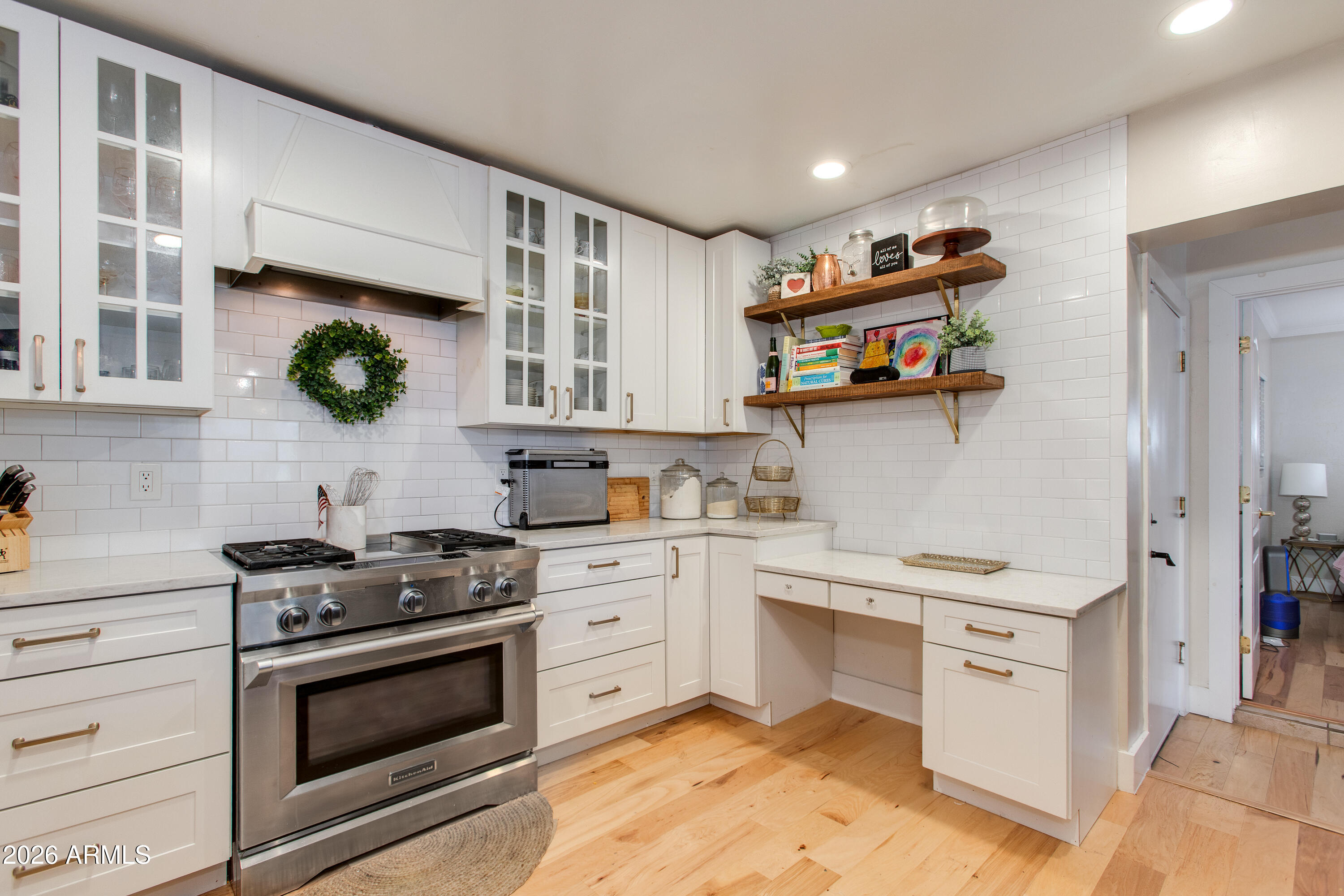 7830 North 7th Avenue Phoenix, AZ 85021 - Photo 41 of 43 a kitchen with white cabinets and appliances