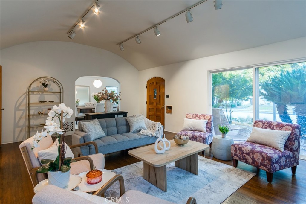 254 South Berkeley Avenue Pasadena, CA 91107 - Photo 2 of 40 a living room with furniture and a large window