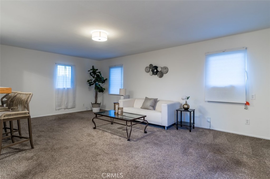 254 South Berkeley Avenue Pasadena, CA 91107 - Photo 30 of 40 a living room with furniture and a potted plant