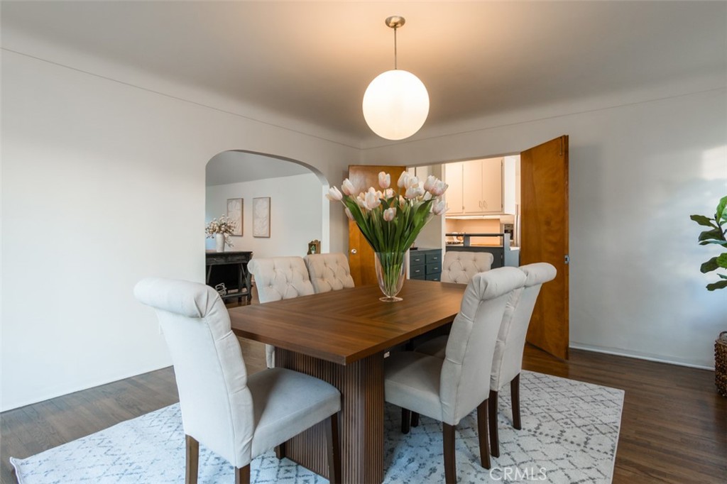 254 South Berkeley Avenue Pasadena, CA 91107 - Photo 3 of 40 a view of a dining room with furniture and wooden floor