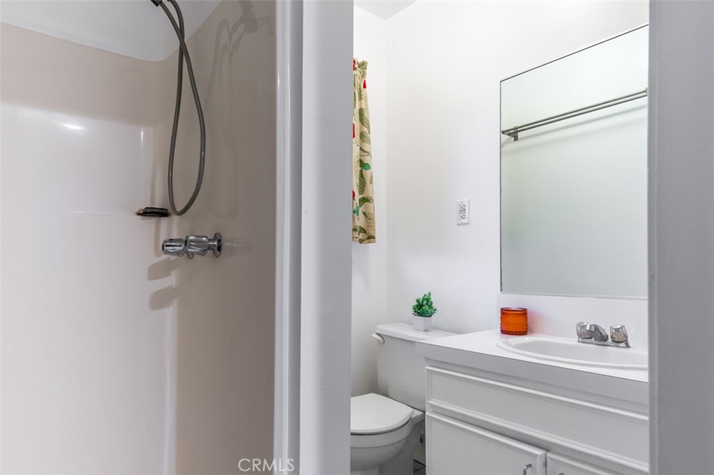 254 South Berkeley Avenue Pasadena, CA 91107 - Photo 34 of 40 a bathroom with a shower a toilet and sink