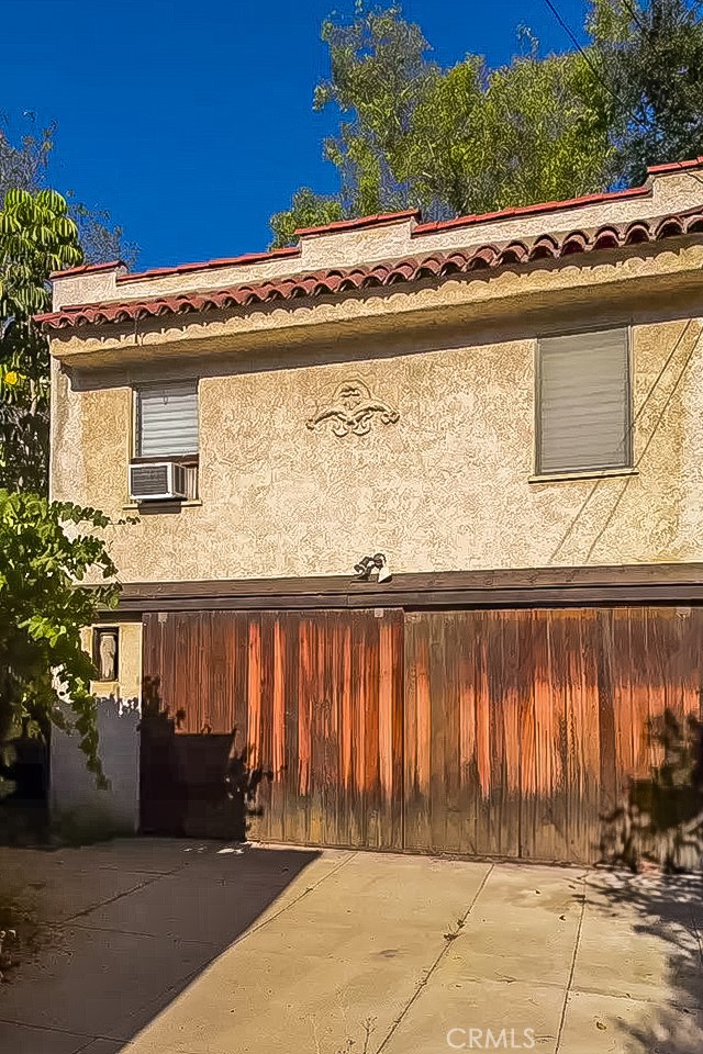 254 South Berkeley Avenue Pasadena, CA 91107 - Photo 40 of 40 a view of a brick house with a large window