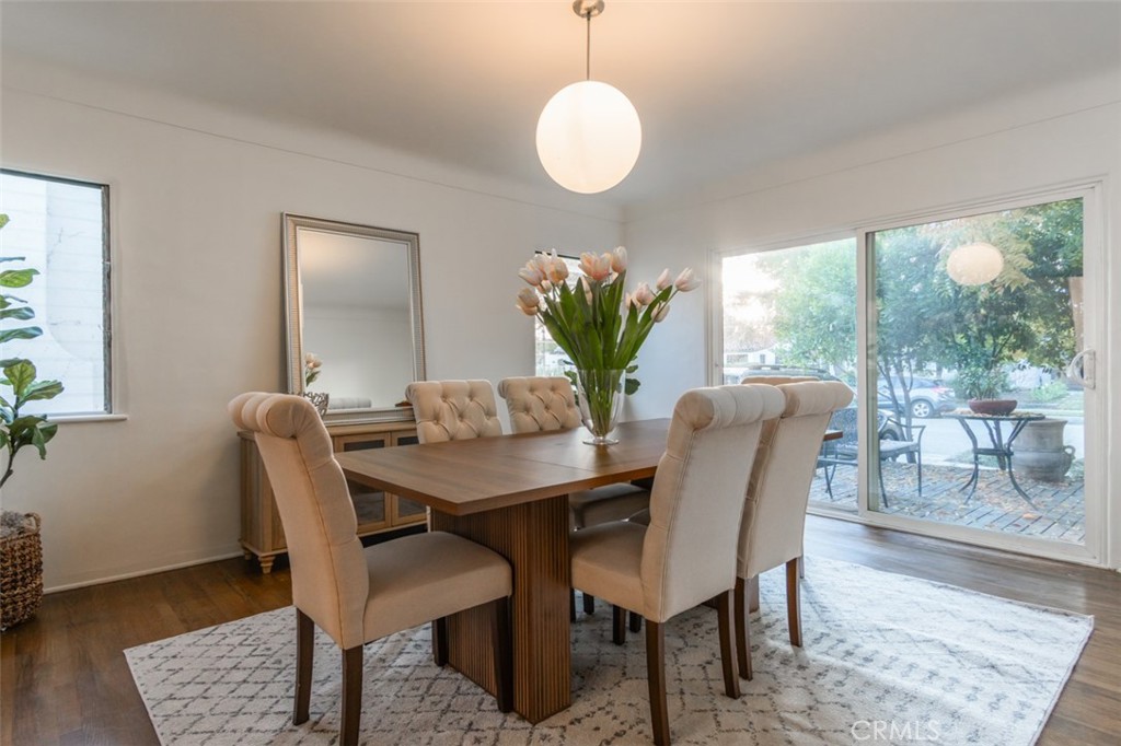 254 South Berkeley Avenue Pasadena, CA 91107 - Photo 4 of 40 a dining room with furniture and wooden floor