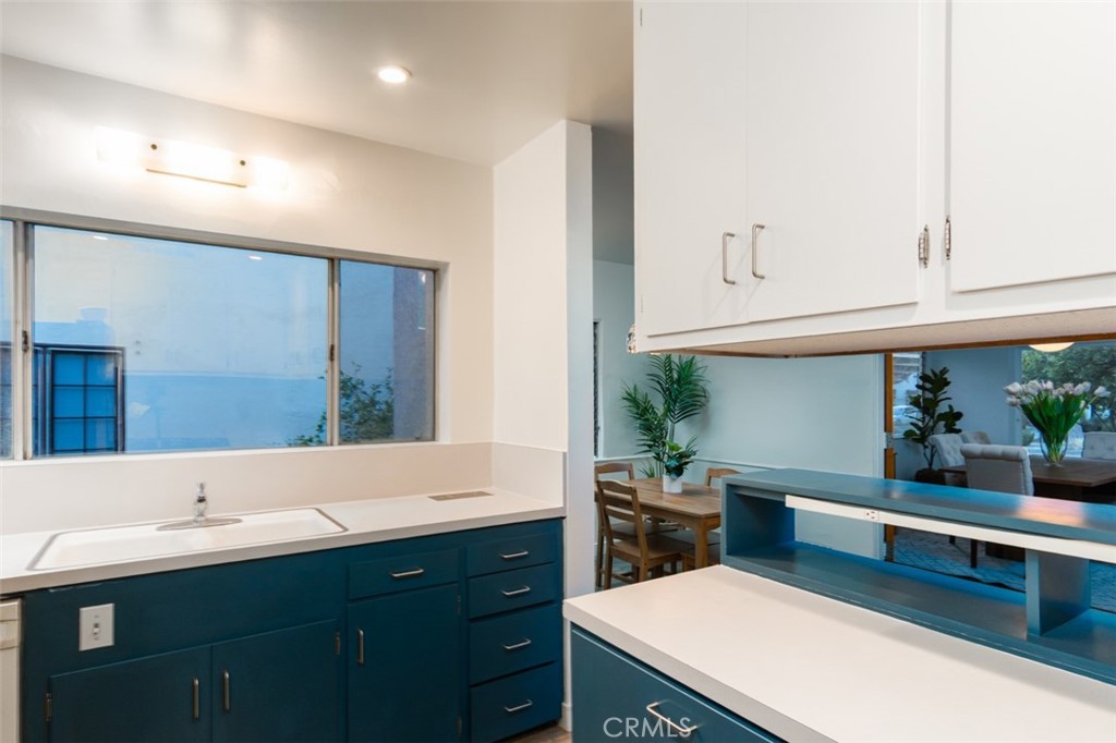 254 South Berkeley Avenue Pasadena, CA 91107 - Photo 8 of 40 a kitchen with a sink and cabinets