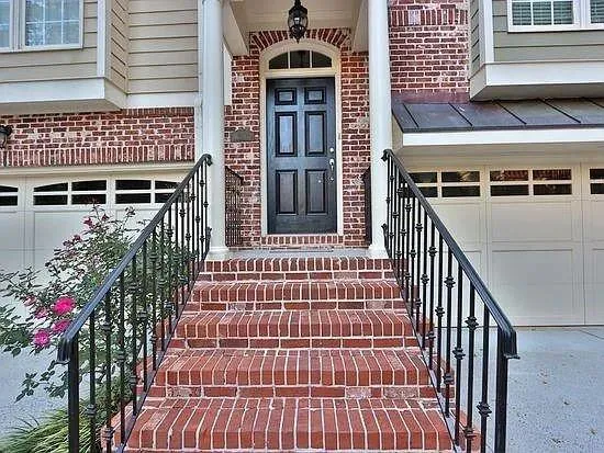a front view of a house with a balcony