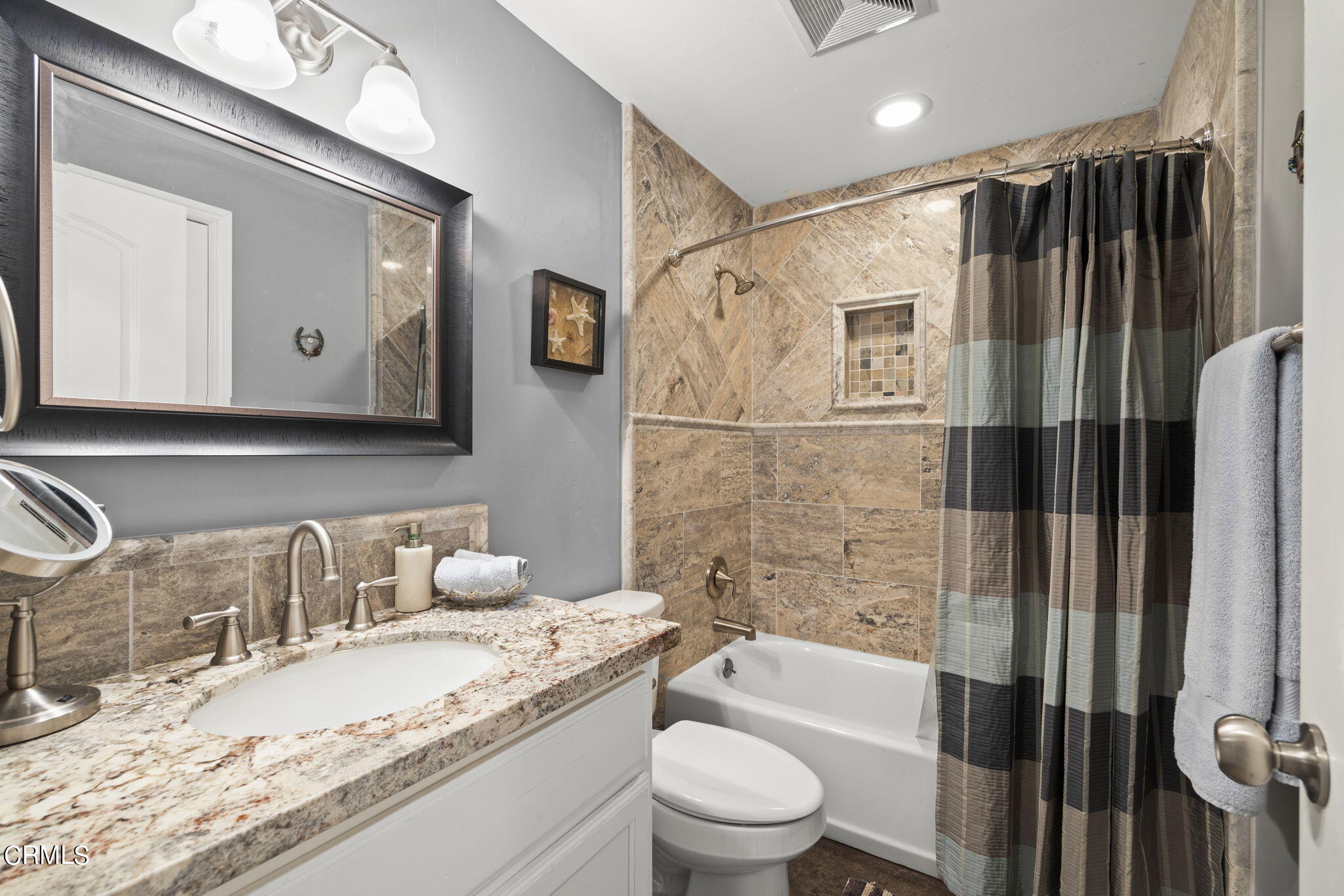 1006 Mesa Drive Camarillo, CA 93010 - Photo 52 of 74 a bathroom with a granite countertop sink toilet and shower