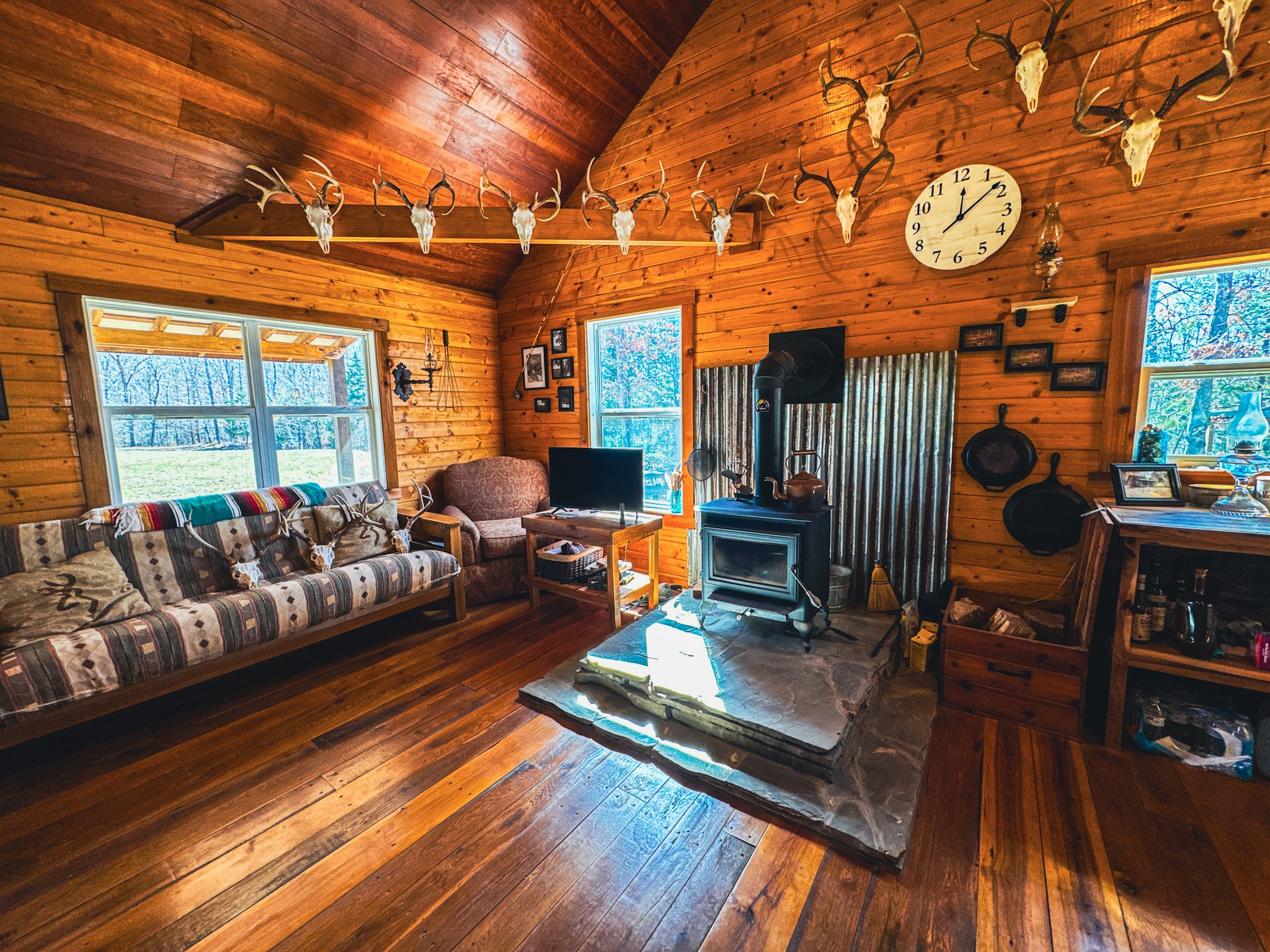 0 Bunker Hill Road Linden, TN 37096 - Photo 13 of 65 a living room with furniture a rug and a chandelier