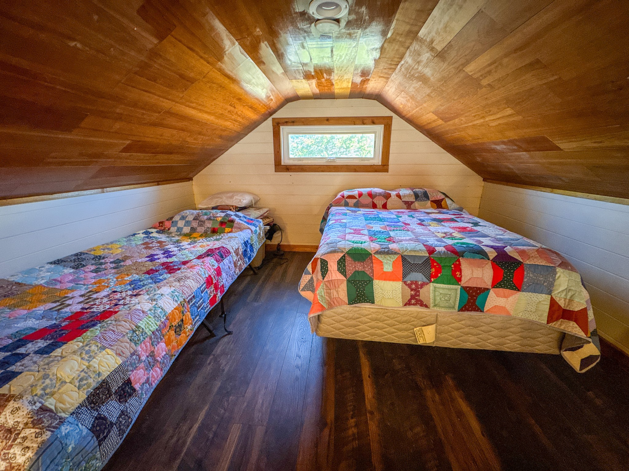 0 Bunker Hill Road Linden, TN 37096 - Photo 17 of 65 a bedroom with a bed a dresser and window