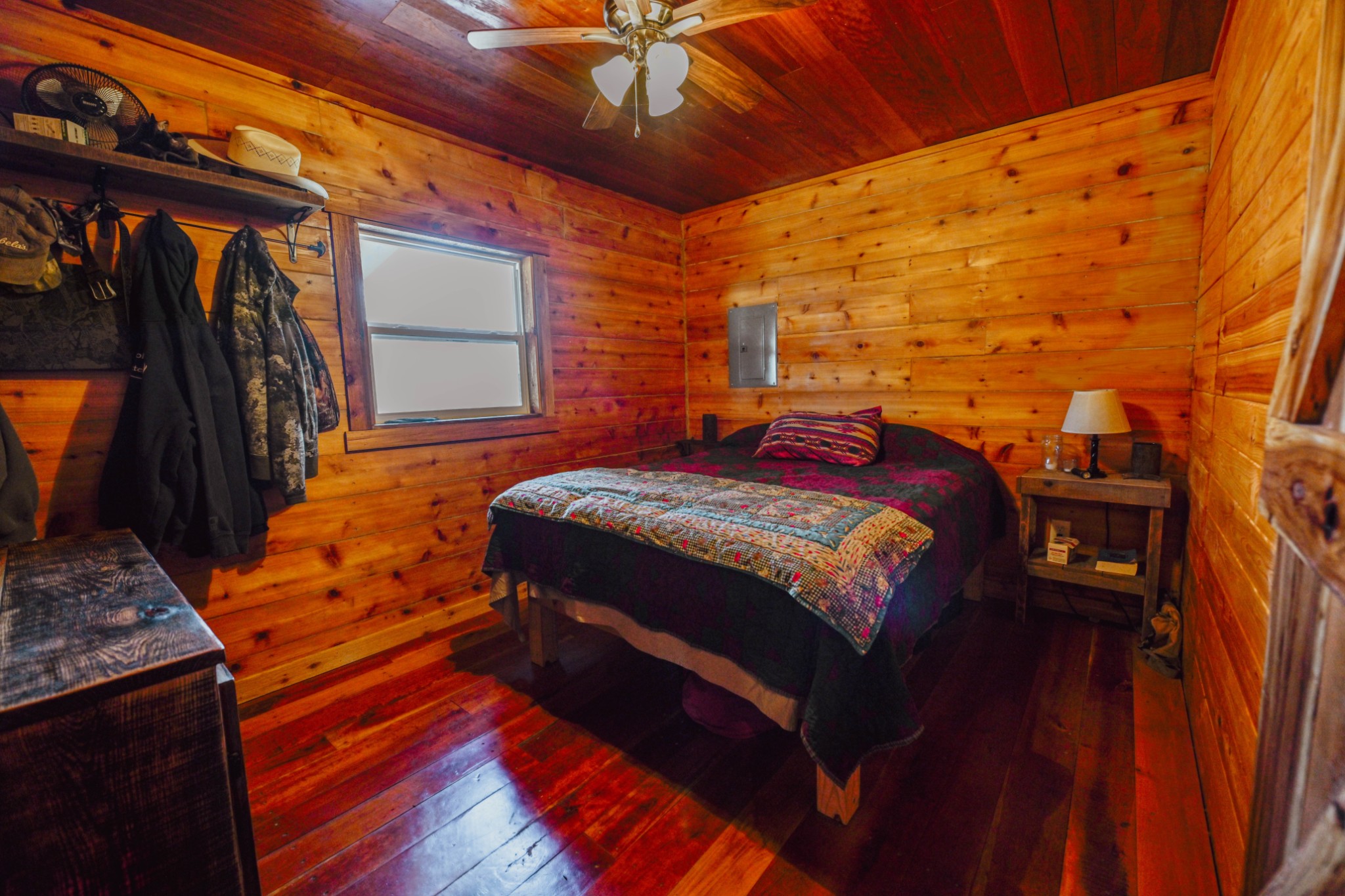 0 Bunker Hill Road Linden, TN 37096 - Photo 18 of 65 a bed sitting in a bedroom next to a window