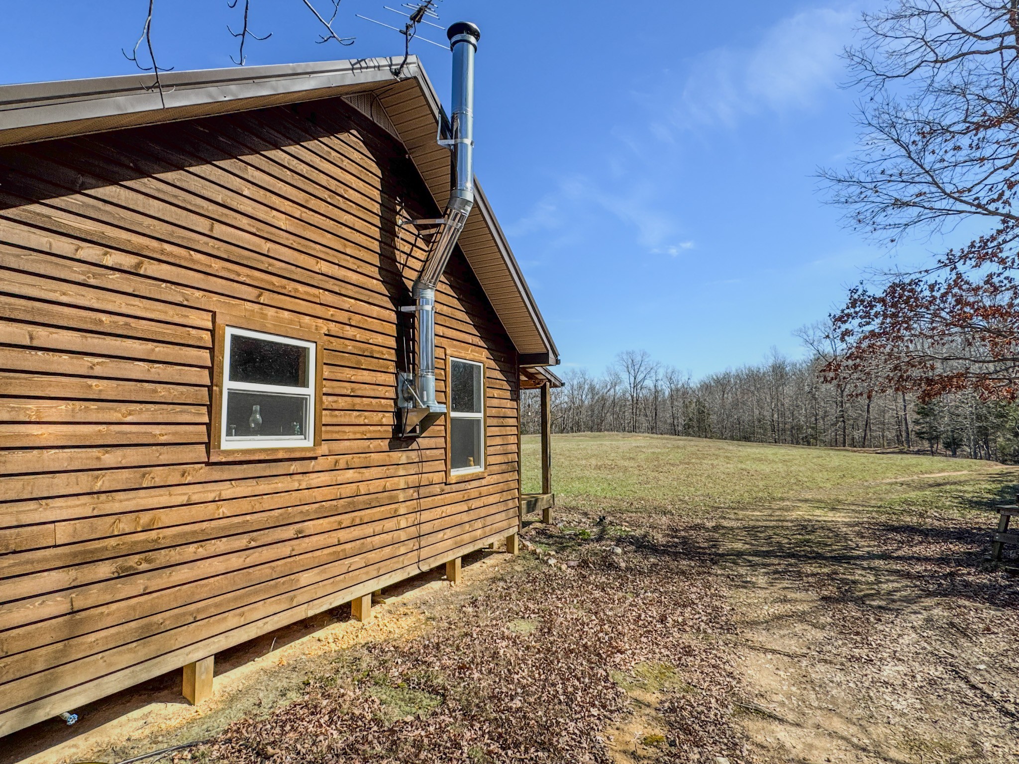 0 Bunker Hill Road Linden, TN 37096 - Photo 27 of 65 a view of a house with a yard